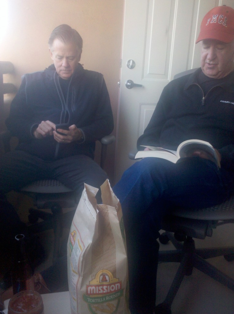 Tim reading from "Conquering the Boderlands," while Mark listens intently! :)