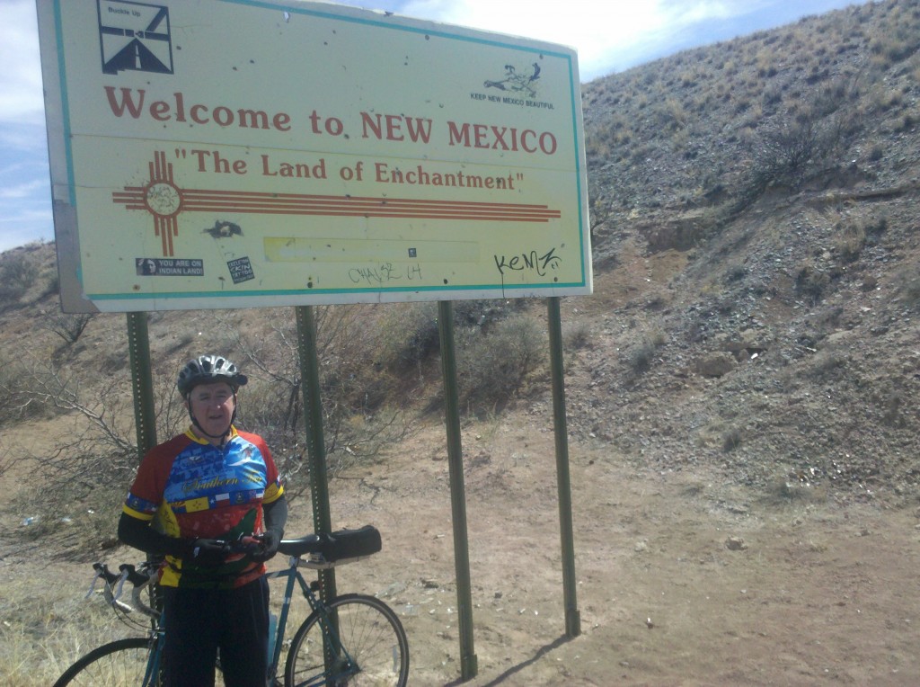 Tim under Welcome to NM! sign.