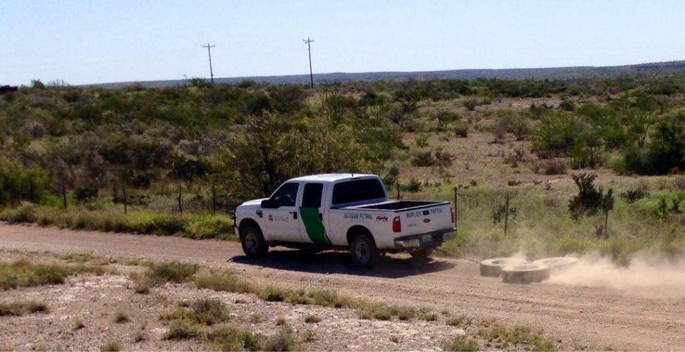 The border patrol drags tires to smooth the dirt and catch illegals leaving tracks. At least that is our guess what he was doing.